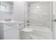 Bathroom with tub and shower combo, updated fixtures, and bright lighting at 346 Mays Rd, Stockbridge, GA 30281