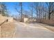 Long driveway leading to the property, framed by wooden fencing at 346 Mays Rd, Stockbridge, GA 30281