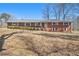 Charming brick home featuring a well-maintained front yard and a classic, inviting facade at 346 Mays Rd, Stockbridge, GA 30281