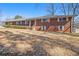 Charming brick home with a well-maintained front yard and classic shutters at 346 Mays Rd, Stockbridge, GA 30281