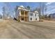 Backyard with a white brick house and a balcony at 4348 Hamilton Mill Rd, Buford, GA 30518