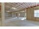 Spacious unfinished basement with exposed beams and concrete floor at 4348 Hamilton Mill Rd, Buford, GA 30518