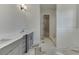 Elegant bathroom features dual vanities and a soaking tub with tiled backsplash at 4348 Hamilton Mill Rd, Buford, GA 30518