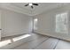 Spacious bedroom with tray ceiling and natural light from energy-efficient windows at 4348 Hamilton Mill Rd, Buford, GA 30518