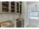 Butler's pantry with custom cabinetry and ample storage, conveniently located near the kitchen at 4348 Hamilton Mill Rd, Buford, GA 30518