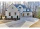 Charming brick home featuring a well-manicured front yard and a concrete driveway at 4356 Hamilton Mill Rd, Buford, GA 30518