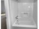 All white tub and shower combination at 1720 Winners Cir, Lawrenceville, GA 30043