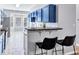 Kitchen area featuring a breakfast bar with seating, enhancing the space's versatility and appeal at 2565 Rocky Ct, South Fulton, GA 30349