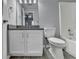 Bright bathroom features a single vanity, framed mirror, and a toilet and bathtub/shower combination at 3154 Panthers Trce, Decatur, GA 30034