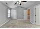 Vaulted ceiling bedroom with carpet, a ceiling fan, and ample natural light at 3154 Panthers Trce, Decatur, GA 30034