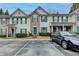 Inviting townhouse with a combination of brick and siding, complemented by green shutters for a charming, cohesive look at 3154 Panthers Trce, Decatur, GA 30034