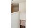 Second floor hallway with white walls and neutral carpet leading to the bedroom at 563 Carleton Pl, Locust Grove, GA 30248