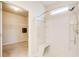 Shower and adjacent walk-in closet in this bathroom, offering ample storage and a clean, bright space at 563 Carleton Pl, Locust Grove, GA 30248