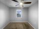 Bedroom with carpet, ceiling fan and window at 318 Kelly Se St, Atlanta, GA 30312