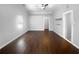 Spacious bedroom with dark wood floors, a vaulted ceiling and neutral paint at 318 Kelly Se St, Atlanta, GA 30312