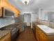 Well-lit kitchen featuring stainless steel appliances and wood cabinets at 318 Kelly Se St, Atlanta, GA 30312