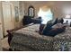 Comfortable bedroom with a large bed, soft lighting, and a serene atmosphere at 355 Tait Rd, Stockbridge, GA 30281