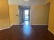 Inviting living room featuring sleek hardwood floors and neutral walls at 355 Tait Rd, Stockbridge, GA 30281