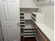 Walk-in closet featuring built-in shelving for optimal storage at 355 Tait Rd, Stockbridge, GA 30281