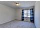 Bedroom with gray carpet, crown molding, and natural light at 3736 Rainbow Cir, Snellville, GA 30039