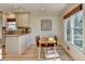 Cozy breakfast nook featuring beadboard detail, natural light, and eat-in dining at 3736 Rainbow Cir, Snellville, GA 30039