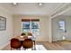 Breakfast nook with a table and large window with a view of the backyard and deck at 3736 Rainbow Cir, Snellville, GA 30039