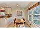 Charming breakfast nook with beadboard detail, natural light, and eat-in dining at 3736 Rainbow Cir, Snellville, GA 30039