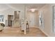 Bright foyer with stylish tile flooring, decorative console table, and views into the living area and staircase at 3736 Rainbow Cir, Snellville, GA 30039