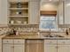 This kitchen features granite countertops, stainless steel appliances, and wooden accents at 3736 Rainbow Cir, Snellville, GA 30039