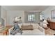 Comfortable living room featuring a large window and a modern bookshelf at 3736 Rainbow Cir, Snellville, GA 30039