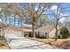 Charming single-Gathering home with well-maintained landscaping and attached garage at 108 Great Oaks Lane, Roswell, GA 30075