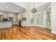 Eat in kitchen area with bay window and granite countertops at 1678 Valor Ridge Nw Dr, Kennesaw, GA 30152