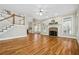 Spacious living room with hardwood floors, fireplace, and ample natural light at 1678 Valor Ridge Nw Dr, Kennesaw, GA 30152