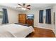 Bedroom featuring hardwood floors, ceiling fan, and natural light at 3250 N Embry Cir, Atlanta, GA 30341