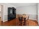 Cozy dining room with hardwood floors, chair rail, and elegant china cabinet at 3250 N Embry Cir, Atlanta, GA 30341