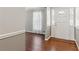 Bright entryway with hardwood floors and elegant door with decorative glass details at 3250 N Embry Cir, Atlanta, GA 30341