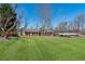 Well-maintained lawn and landscaping enhance the curb appeal of this inviting single story brick home at 3250 N Embry Cir, Atlanta, GA 30341