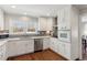 Bright kitchen featuring white cabinetry, stainless steel appliances, and granite countertops at 3250 N Embry Cir, Atlanta, GA 30341