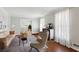 Cozy living room featuring hardwood floors, neutral paint, and abundant natural light at 3250 N Embry Cir, Atlanta, GA 30341