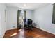 Well-lit home office featuring hardwood floors and a large window at 3250 N Embry Cir, Atlanta, GA 30341