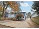 Home exterior showcasing a wooden deck with stairs and a spacious backyard area with private driveway at 761 Bellemeade Nw Ave, Atlanta, GA 30318