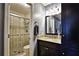 Bathroom featuring a glass enclosed shower and a granite vanity at 1013 Canyon Point Cir, Roswell, GA 30076