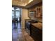 Kitchen area with stainless appliances, granite countertops, and dining area beyond at 1013 Canyon Point Cir, Roswell, GA 30076