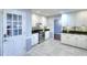Bright kitchen features stainless steel appliances and ample storage at 4020 Winchester Way, Loganville, GA 30052