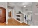 Bright hallway with hardwood floors and a view of the staircase leading to the lower level at 218 Sutallee Ridge Ne Ct, White, GA 30184