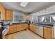 Open-concept kitchen featuring stainless steel appliances and plenty of cabinet space at 218 Sutallee Ridge Ne Ct, White, GA 30184