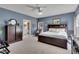 Spacious main bedroom featuring light-filled windows, ensuite access, and elegant décor at 218 Sutallee Ridge Ne Ct, White, GA 30184