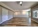 Finished basement with ceiling fan and neutral walls at 2300 Kate Moore Way, Buford, GA 30518