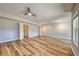 Finished basement with windows and ceiling fan at 2300 Kate Moore Way, Buford, GA 30518