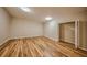 Neutral bedroom with wood floors and closet at 2300 Kate Moore Way, Buford, GA 30518